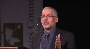 Dr. David E. Guggenheim addresses the World Affairs Council of Western Michigan