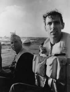 Jacques Piccard and Don Walsh emerge from the bathyscaphe Trieste following their successful descent to the bottom of the Pacific Ocean's Mariana Trench in January 1960. Walsh and Piccard were the first people to reach the trench's ? and Earth's ? lowest point, Challenger Deep, some 35,800 feet below the ocean surface. Piccard, who died in 2008, was posthumously awarded the Hubbard Medal, the National Geographic highest honor, at a ceremony in Washington, D.C., on June 14, 2012 (Photo: Thomas J. Abercrombie; ? National Geographic)